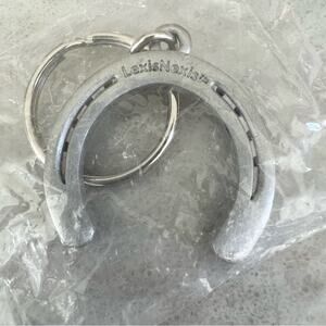 LexisNexis horseshoe keychain collectible metal silver tone